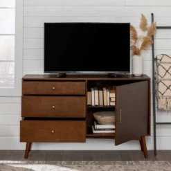 Mid-Century Modern With Closed Storage TV Stand For TVs Up To 58" Walnut - Saracina Home 13 Mid-Century Modern With Closed Storage TV Stand For TVs Up To 58" Walnut - Saracina Home -Saracina Home GUEST 272c04f3 ea07 453c 9824 8666892ac8d7